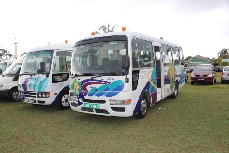 Nissan and Mitsubishi rosa buses