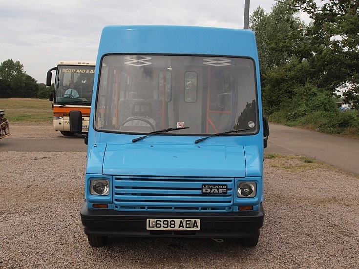A rather funny blue for a bus